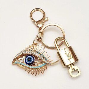 Authentic Louis Vuitton Lock & Key with unbranded Eye Bagcharm, Keycharm